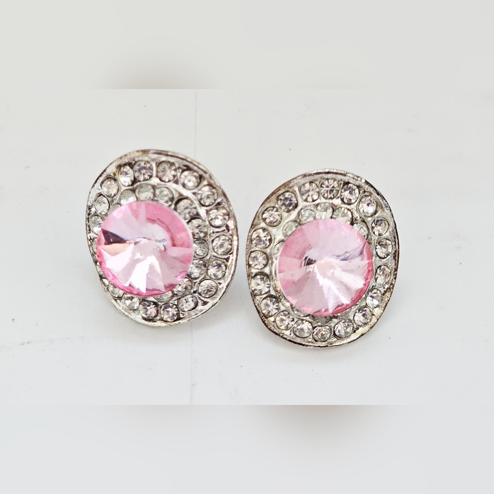 faceted pink crystal center stone encircled smaller clear rhinestones Stud Earri